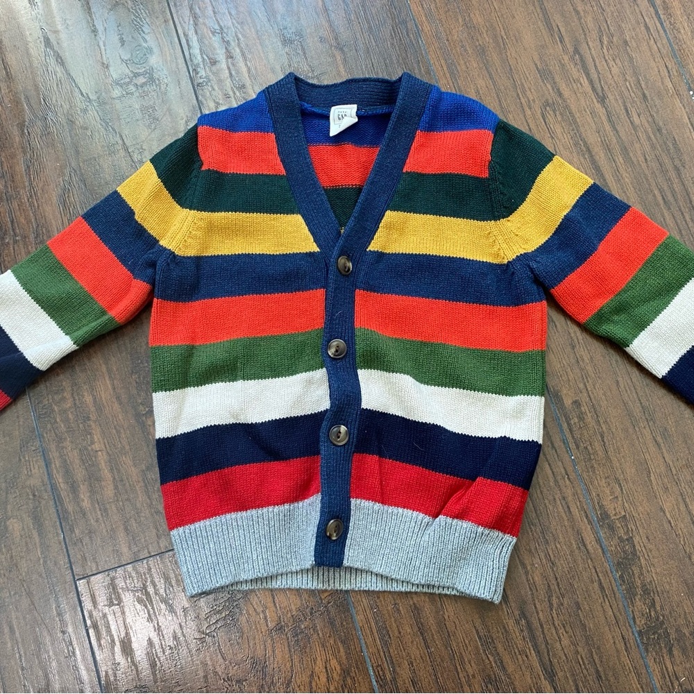 Multicolored sweater vest, worn only once